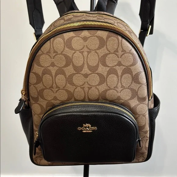 Coach | Bags | Coach Tan And Black Signature Backpack | Poshmark display picture 1